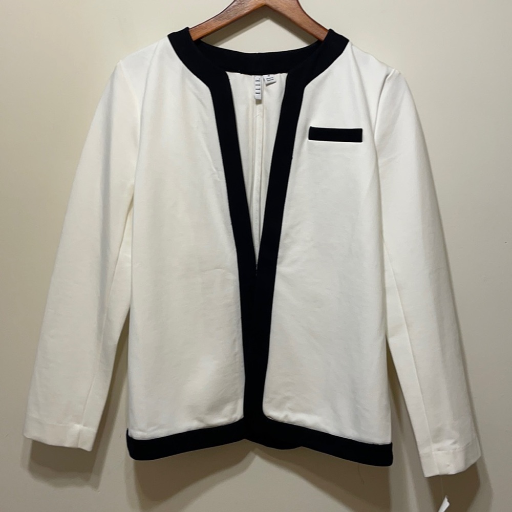 White blazer with black trim